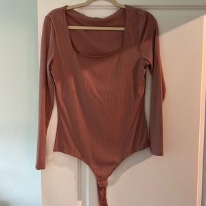 Elodie blush body suit long sleeve